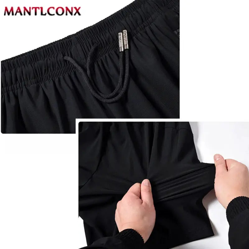 MANTLCONX black sports shorts with drawstring waistband for men, lightweight stretch fabric for gym fitness