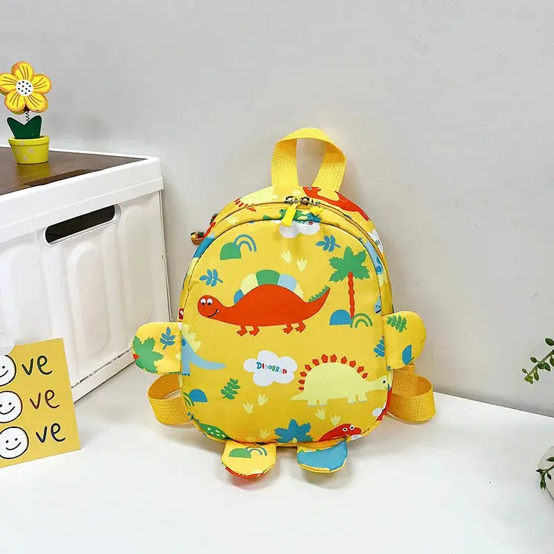 Kids dinosaur backpack yellow with colorful dinosaur print by Simples Market