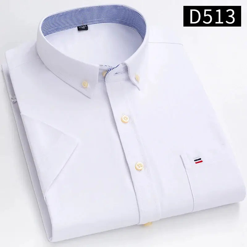 White Oxford shirt with blue striped inner collar, button-down front, and small striped flag emblem on the cuff