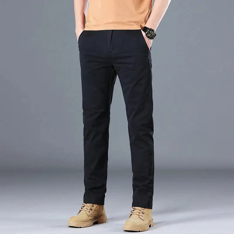 Men's slim-straight cotton-stretch trousers in solid black by Simples Market