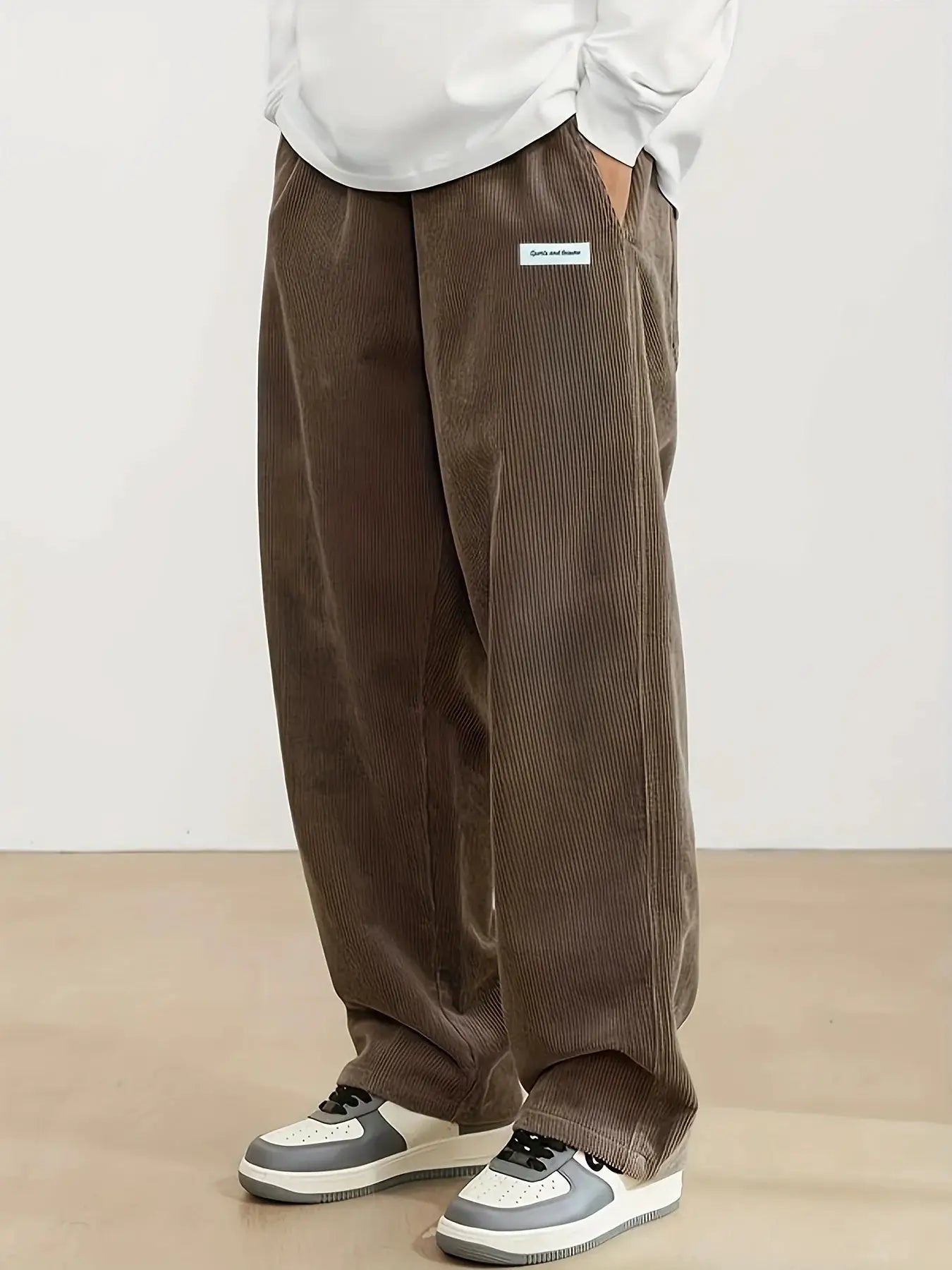 Simples Market men's brown corduroy pants with elastic drawstring waist, loose straight fit