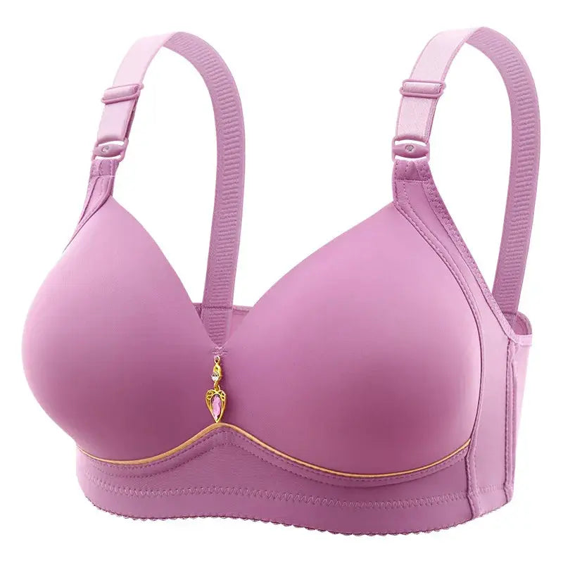 Bra lavender molded-cup wireless with adjustable straps, glossy finish, gold trim and charm between cups