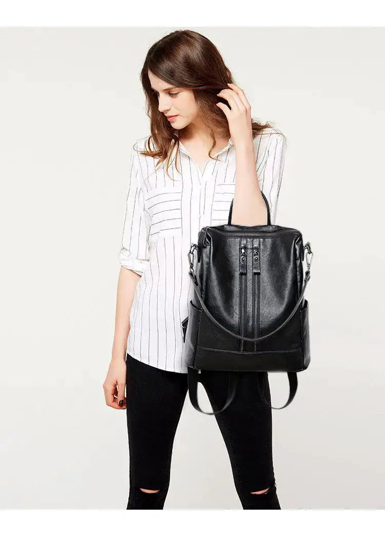 Women's soft leather backpack in black by Simples Market; large-capacity school and travel bag