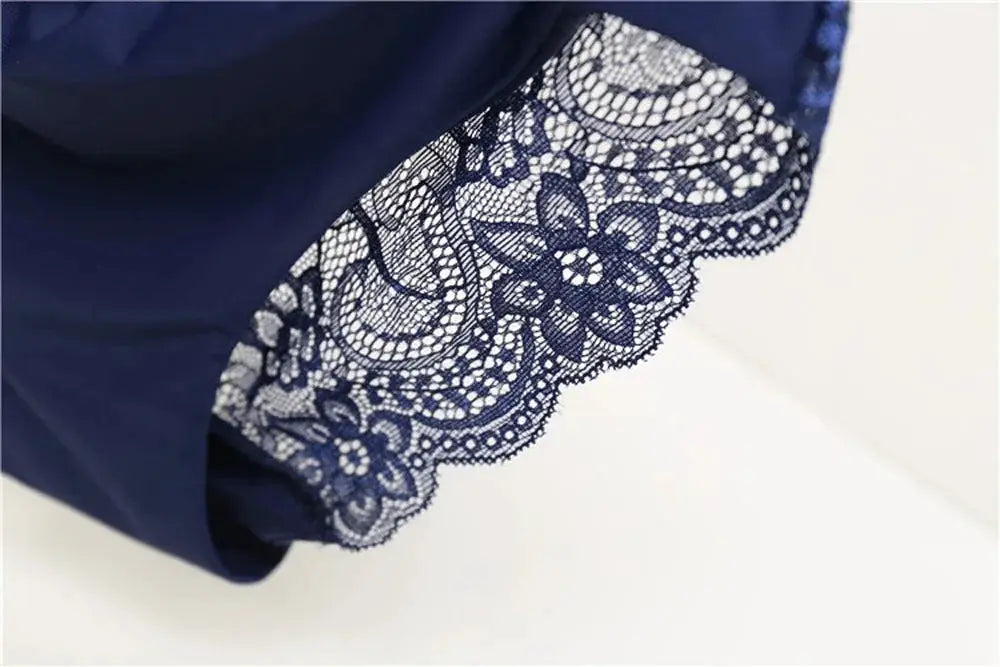 Navy blue women's panties with floral lace trim along the leg openings