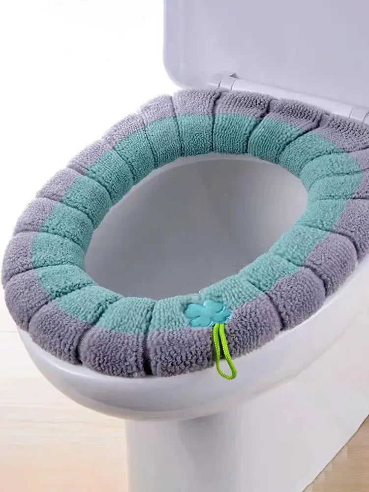 Thick plush toilet seat cover pad in gray and teal, stretchy warmer with green loop