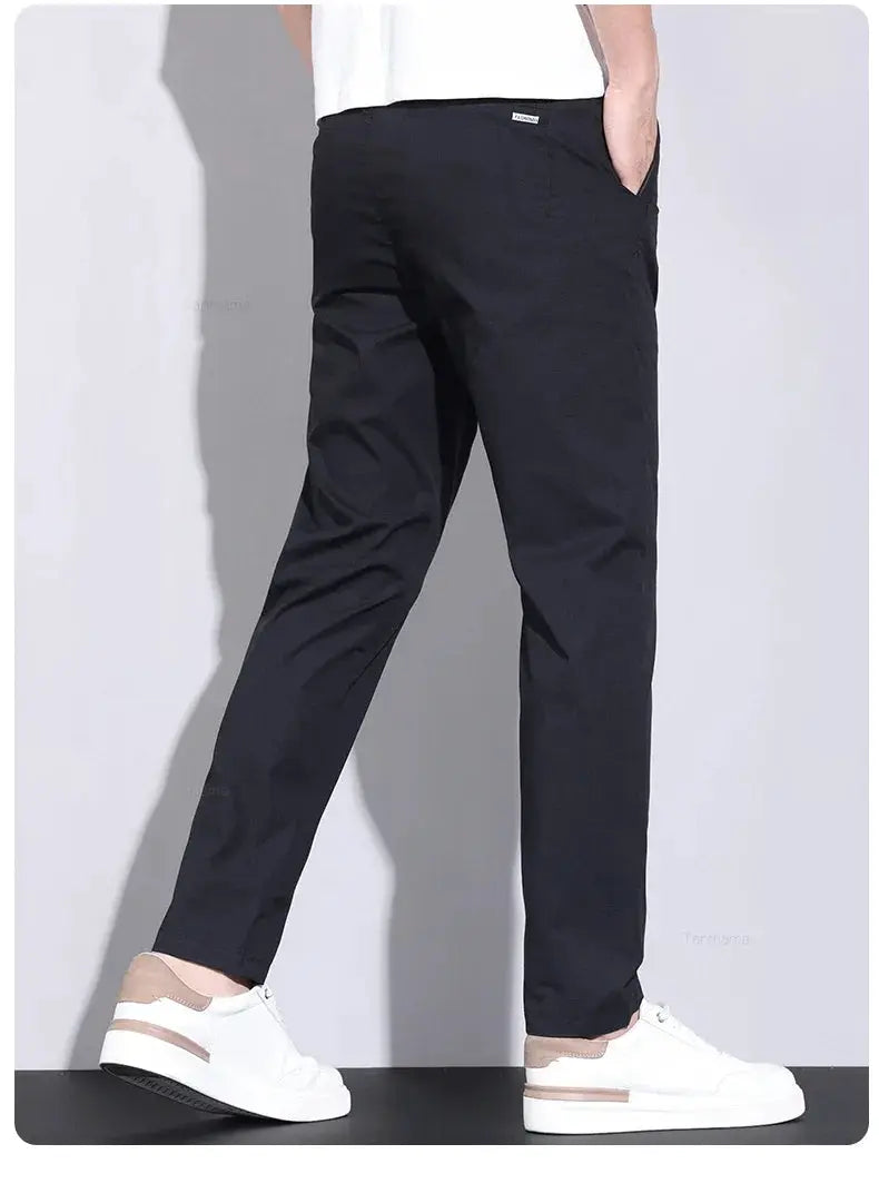 Ultra-thin Elastic men's casual pants by Simples Market, black slim-straight trousers with back logo tag