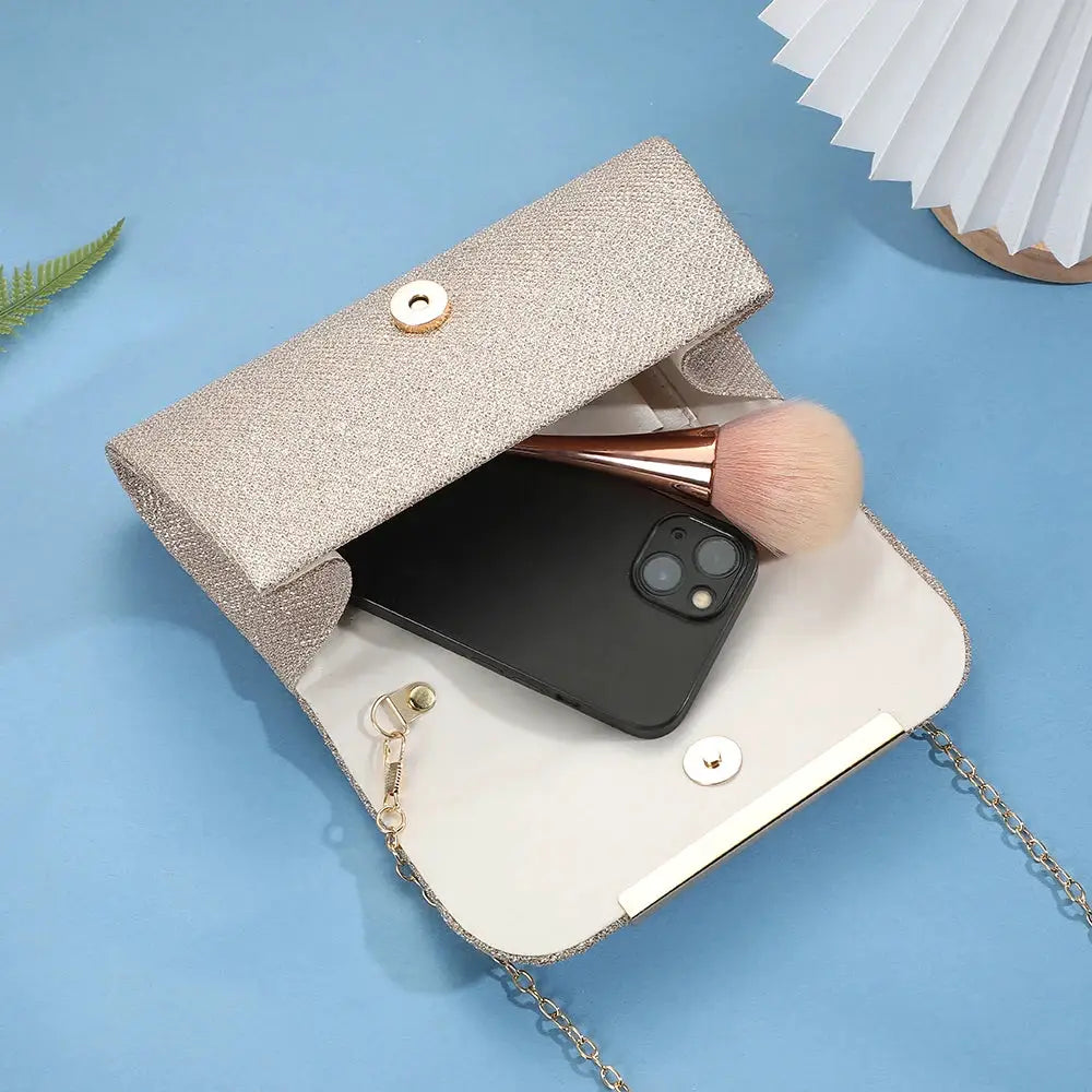 Simples Market sequined clutch bag with chain strap; rose gold glitter evening purse holding phone and makeup brush