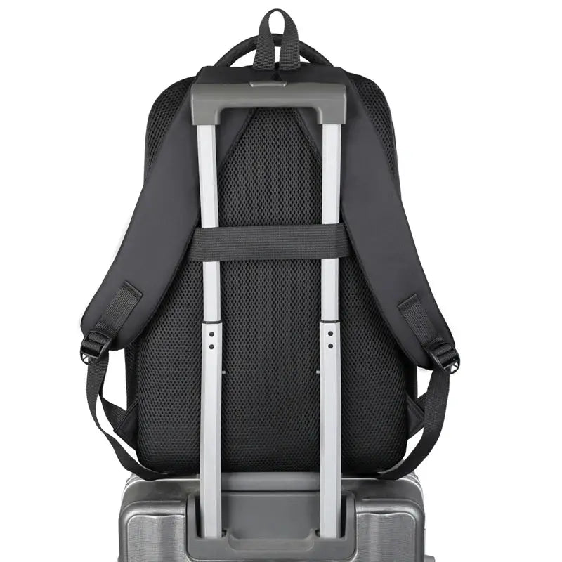 Simples Market travel backpack in dark gray, durable large-capacity laptop backpack on a rolling suitcase