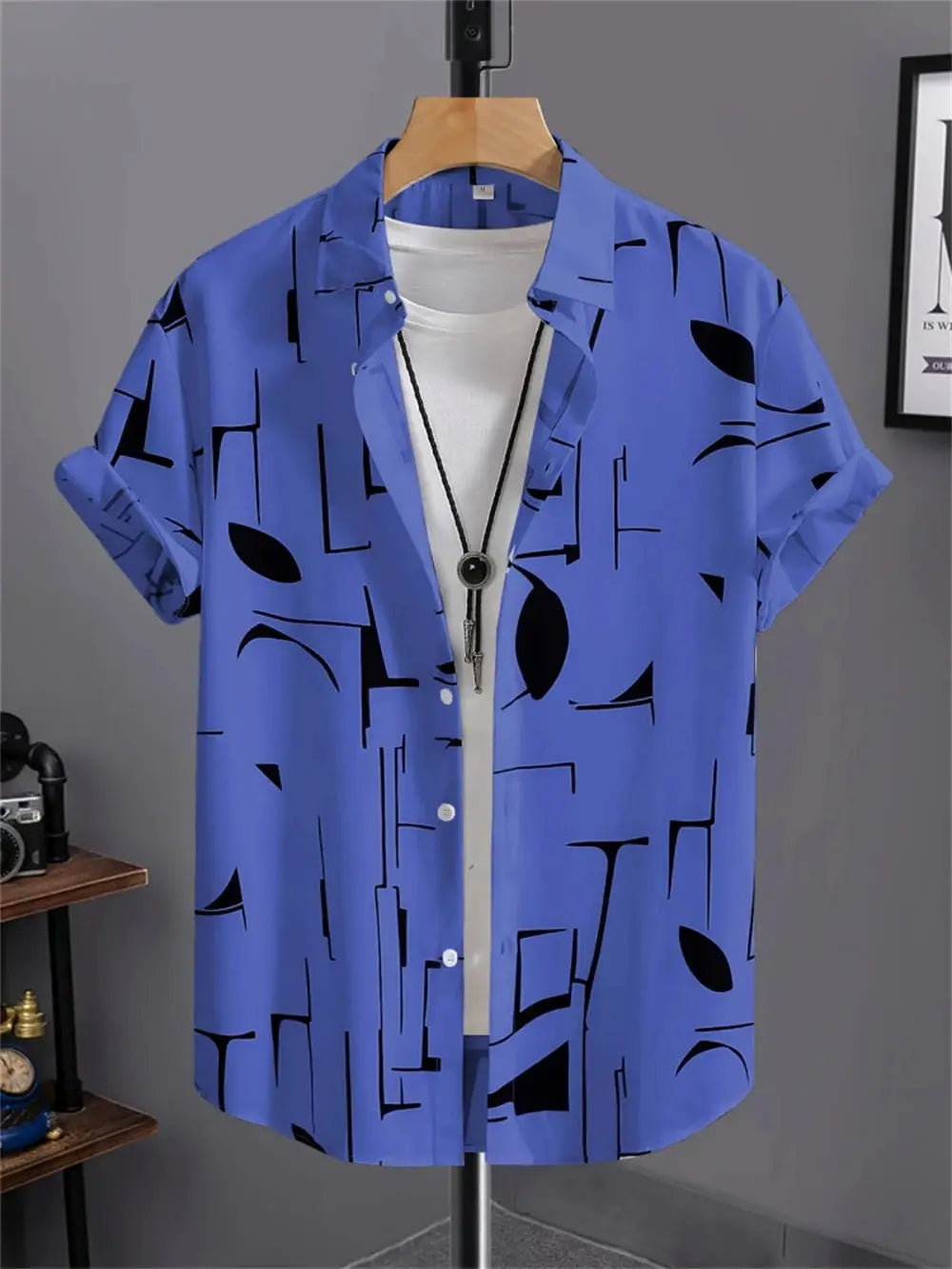 Men's blue short-sleeve shirt with black abstract geometric print by Simples Market