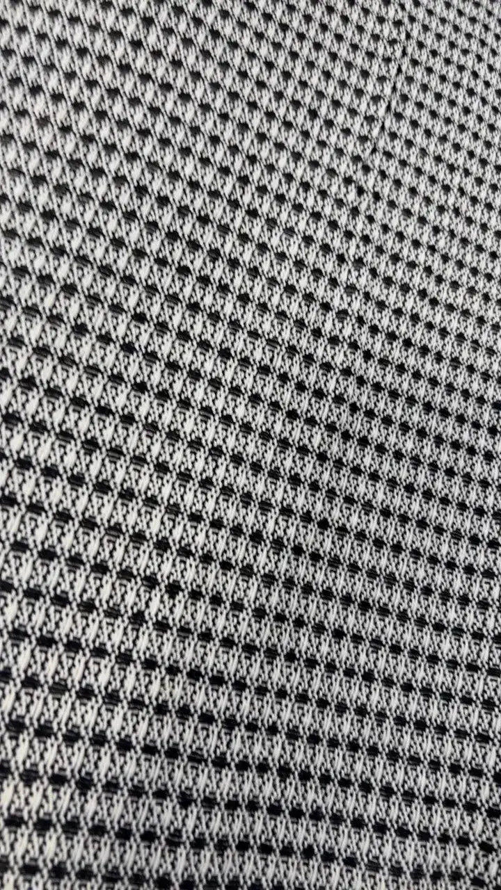 Sofa cushion cover by Simples Market in black-and-white woven fabric