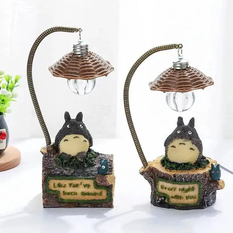 Totoro LED desk lamp set of 2 by Simples Market, mushroom shade with flexible gooseneck on mossy log bases.