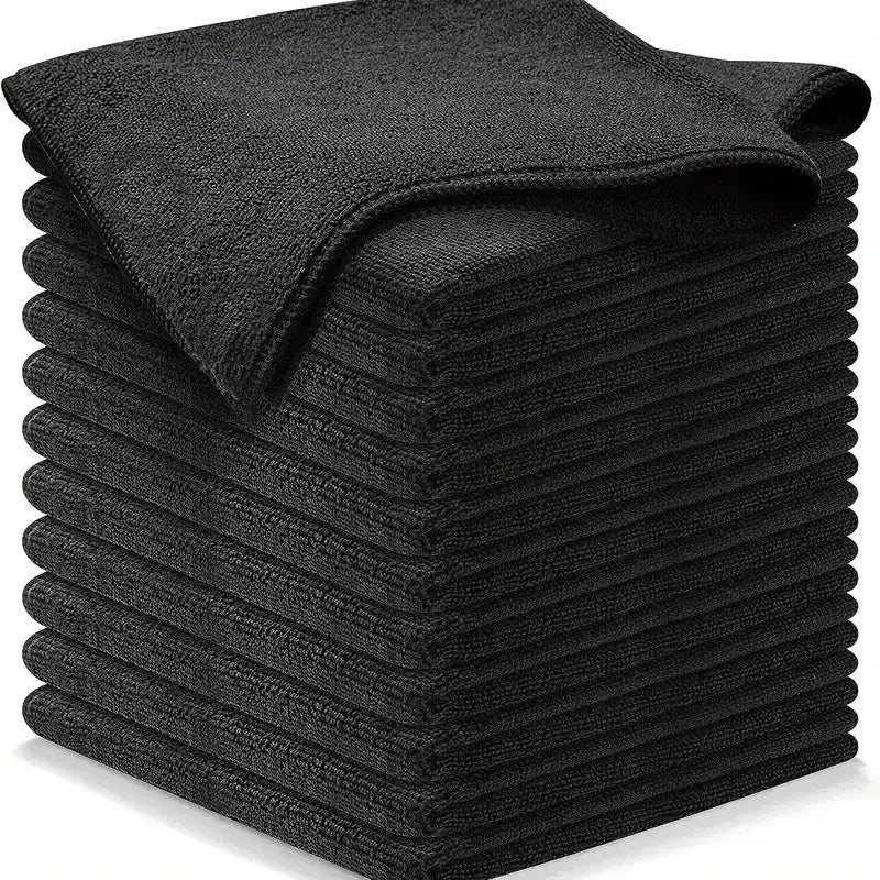 Simples Market thick black microfiber cleaning cloths, lint-free reusable towels stacked in a pile