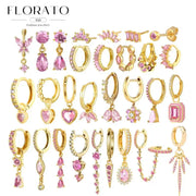 Florato gold-tone pink zircon earrings collage with assorted hoop, pendant, and stud designs; fashion jewelry