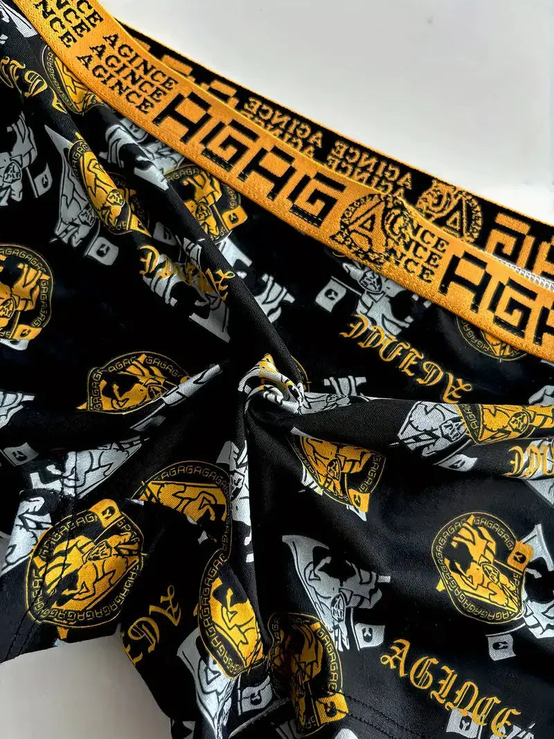 4-piece men's boxer shorts set by Simples Market; black fabric with yellow retro print and orange branded waistband