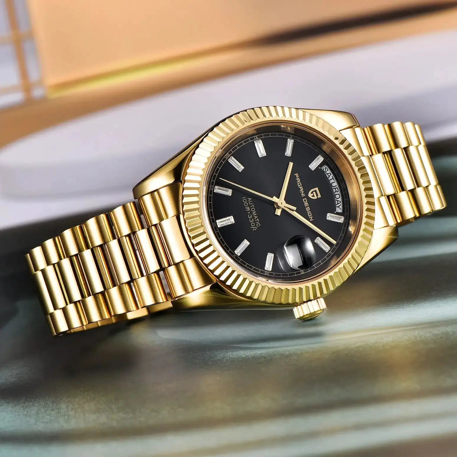 PAGANI DESIGN gold-tone men's automatic wristwatch with black dial, date window, fluted bezel
