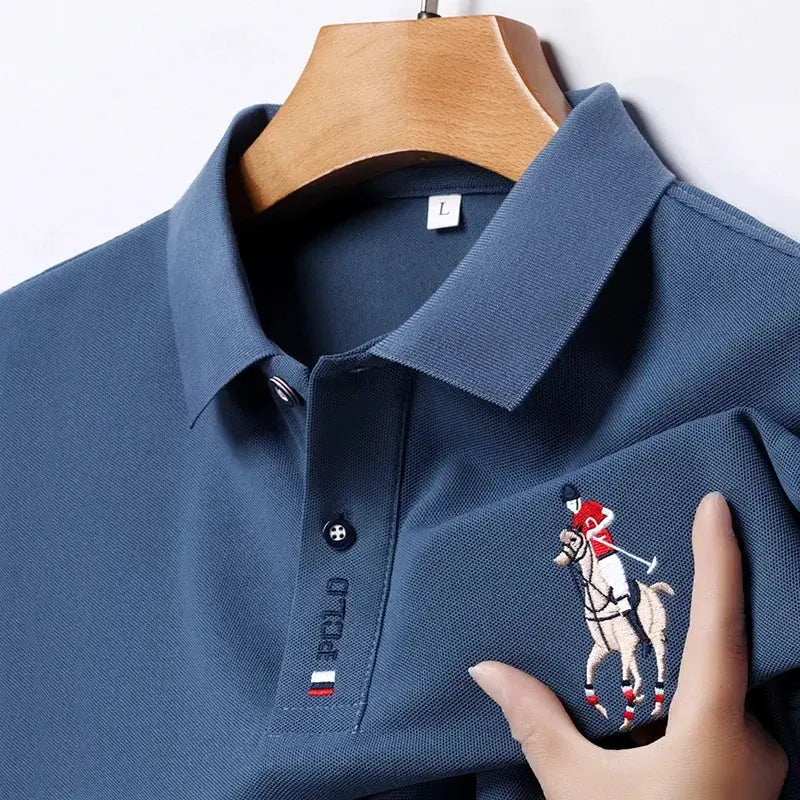 Men's blue polo shirt with embroidered polo player logo on chest pocket, short sleeves