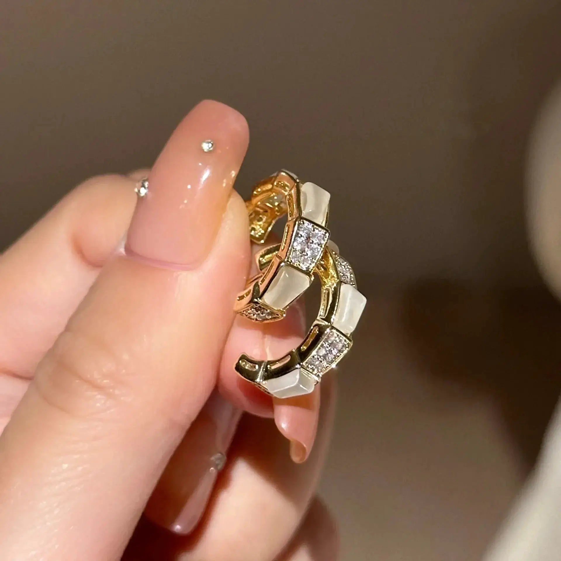 Exaggeration Ocean Style shell texture stud earrings by Simples Market; gold-tone metal with crystal accents
