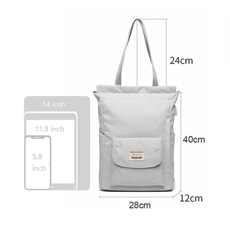 Women’s waterproof backpack by Simples Market in light gray Oxford canvas with pocket; fits up to 15.6-inch laptops.