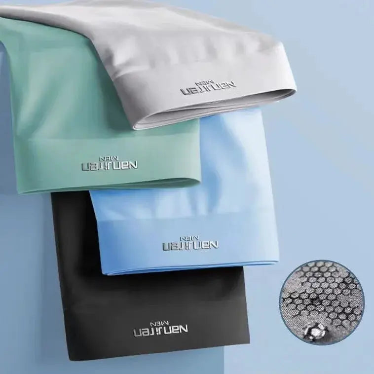 4-pack Simples Market breathable ice silk men's boxer shorts in white, mint, light blue, and black with logo.