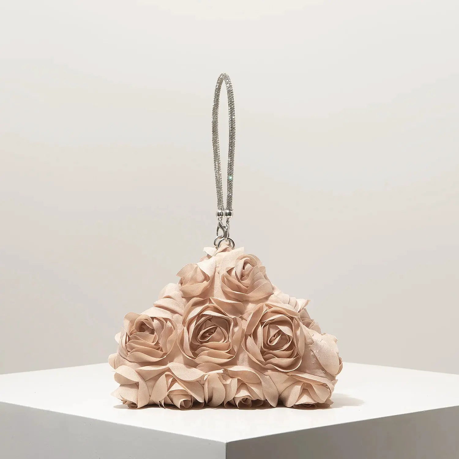 Mini floral clutch by Simples Market with blush beige rosette base and rhinestone strap