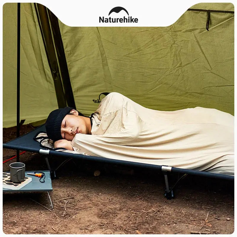 Sleeping bag liner by Naturehike, beige ultralight mummy-style travel sheet used in tent