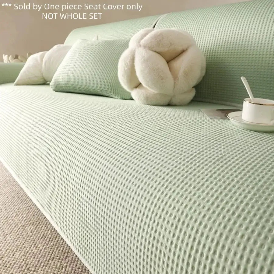 Summer Cooling Touch anti-slip sofa cover in mint green with textured waffle knit