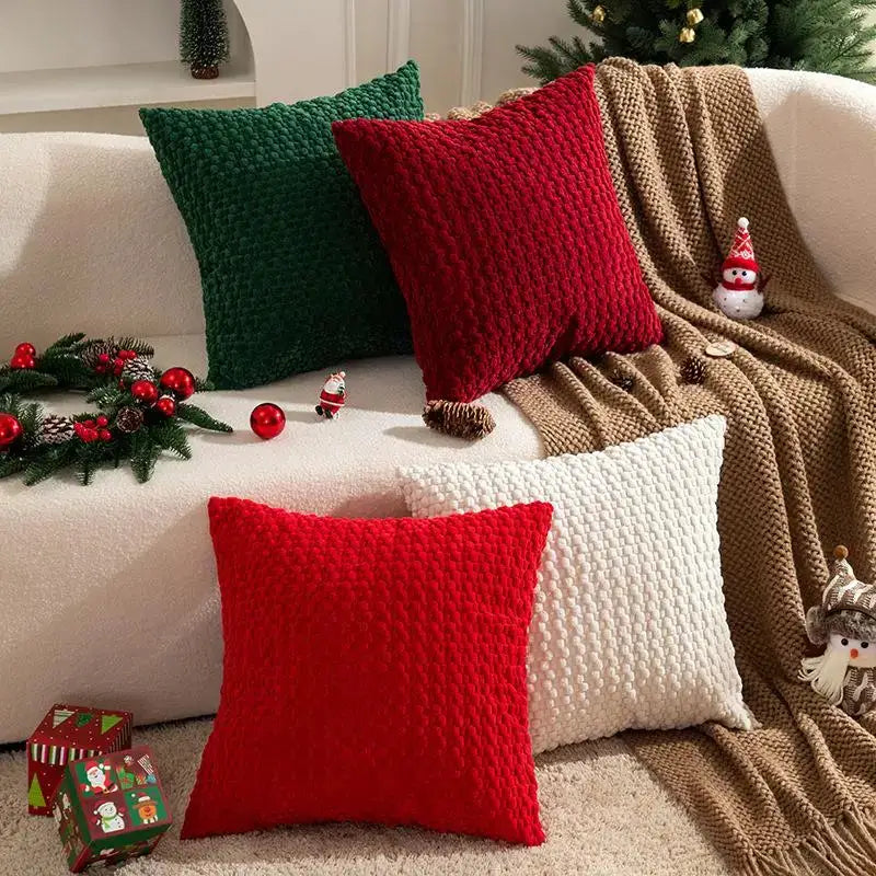 Soft velvet double-sided cushion covers; four-piece set in red, green, and white on a cream sofa.