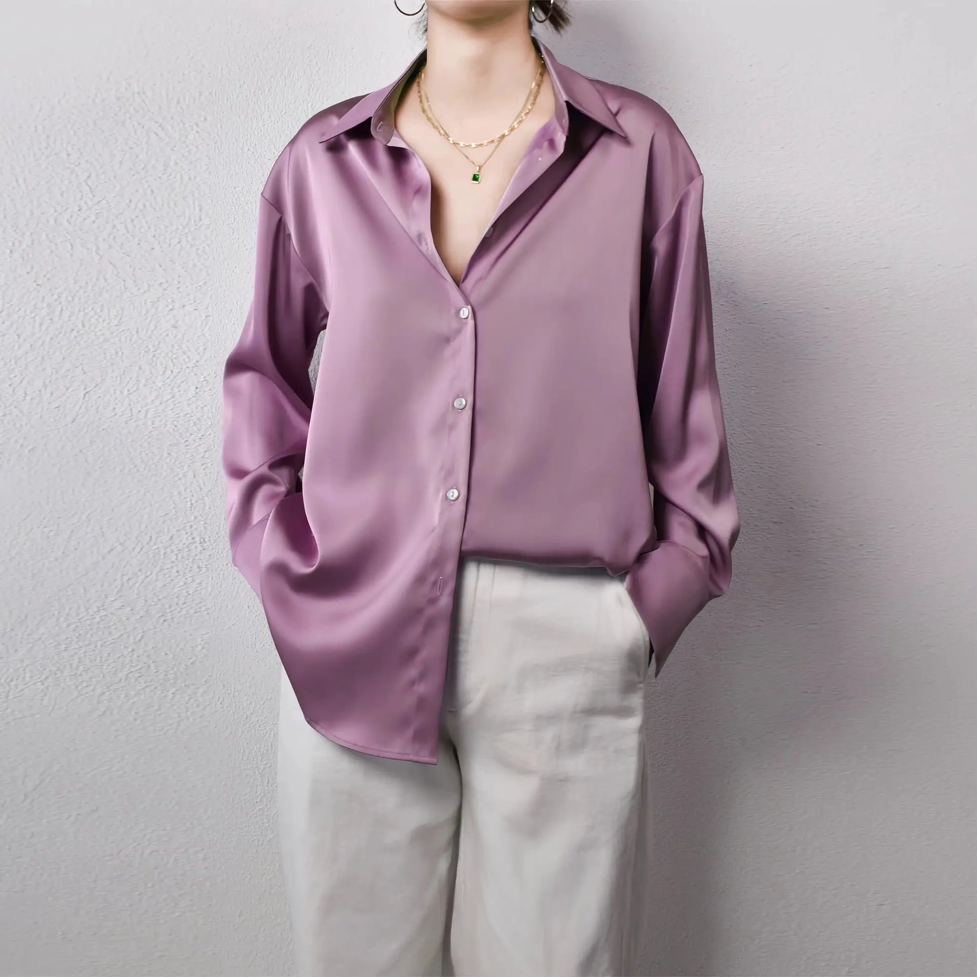 Satin purple blouse with collar and button-down front for women.