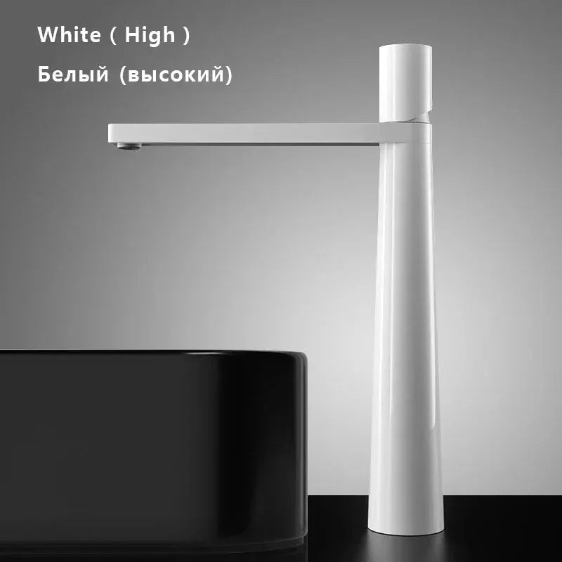 White modern basin faucet with a long horizontal spout and single lever, tall pedestal beside a black washbasin