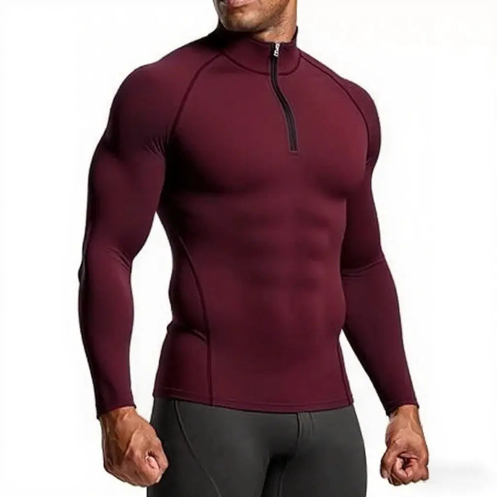 Men's slim-fit burgundy long-sleeve fitness top with half-zip front