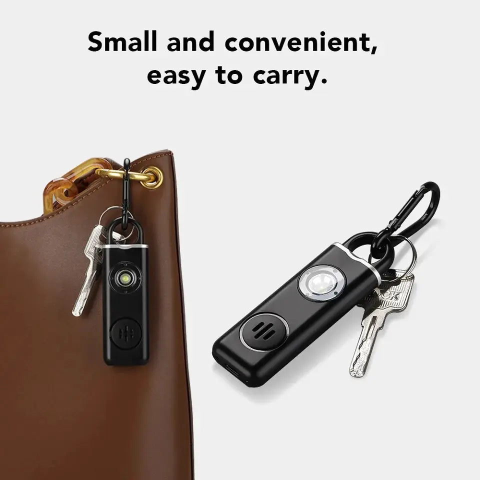 Two Hollarm self-defense alarm keychains by Simples Market, black with LED light and 130dB rechargeable siren