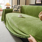 Couch cover in green chenille with fringe and herringbone texture; Simples Market heavyweight sofa blanket.