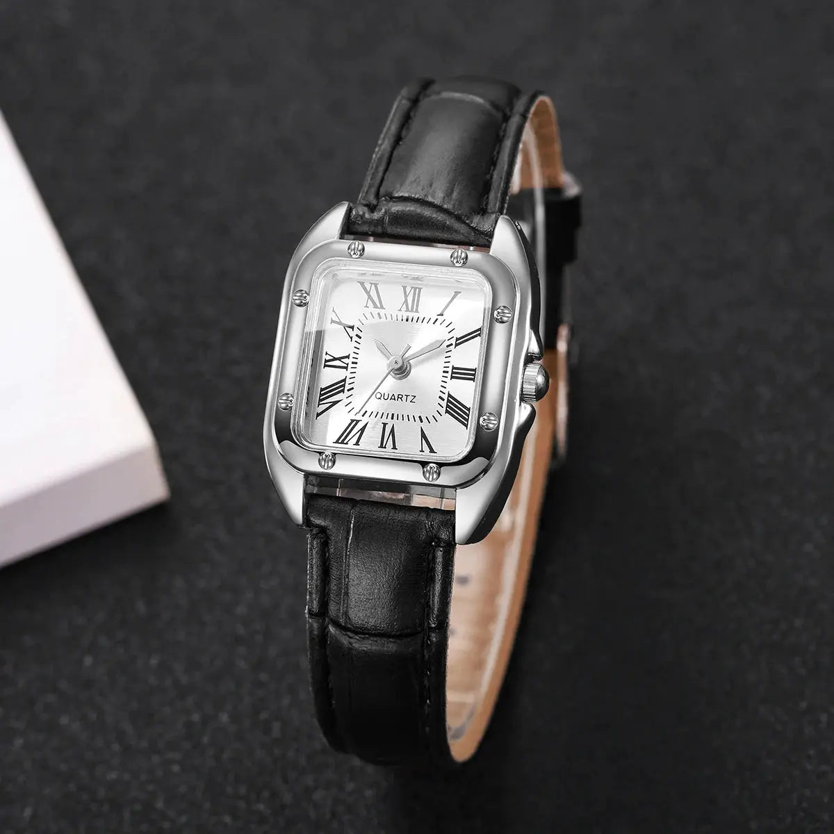 Fashion square women's quartz wristwatch with black leather strap and silver-tone case, Roman numeral dial