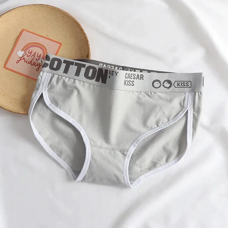 Women’s gray cotton briefs with white trim and elastic waistband, breathable underwear.