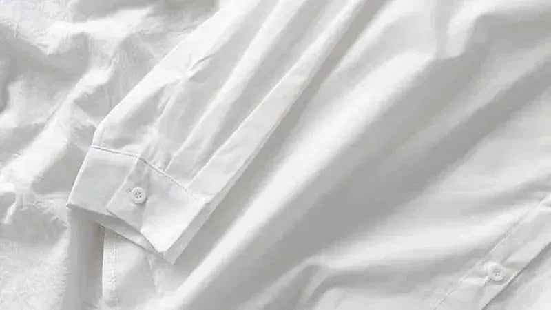 Simples Market white oversized long-sleeve shirt with turn-down collar