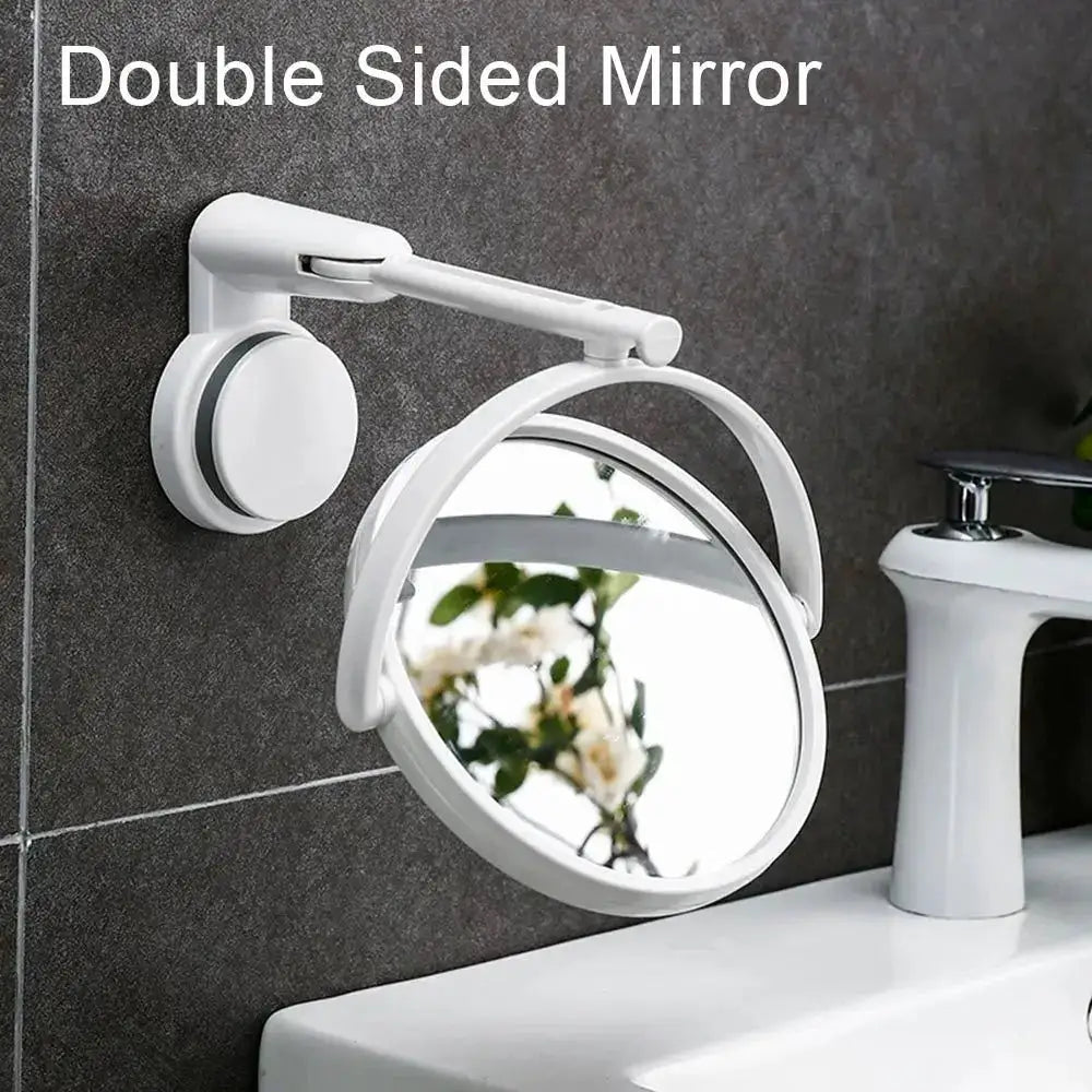 White round double-sided bathroom mirror with rotating wall-mounted arm and suction cup