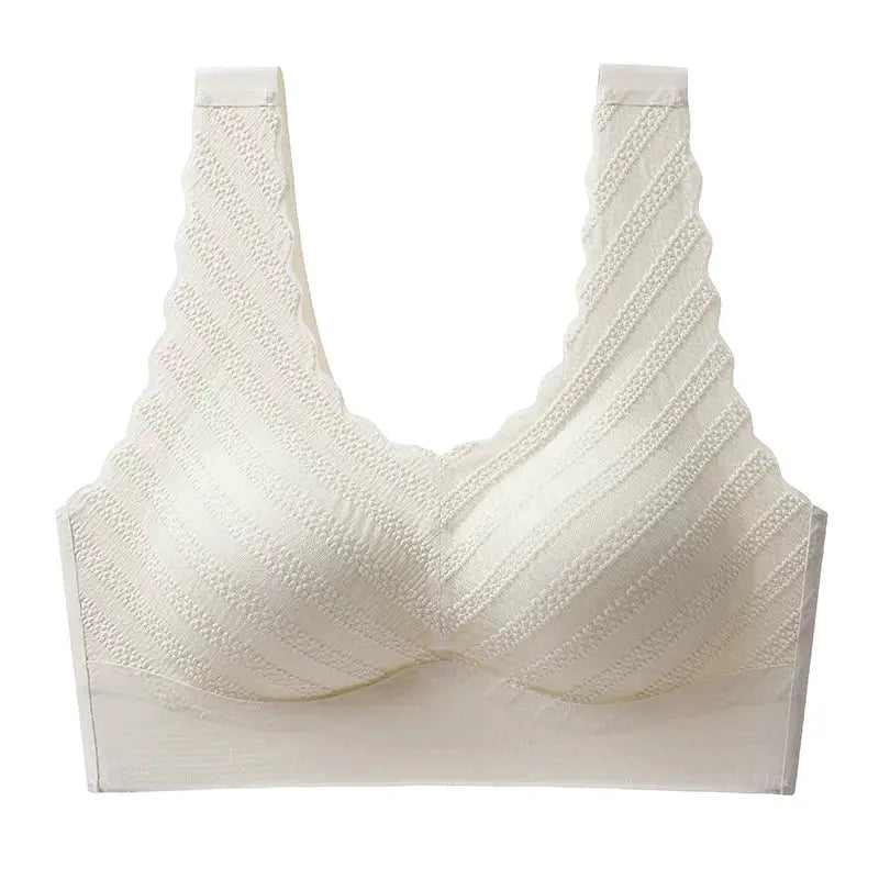 Seamless wireless sports bra in white with textured knit pattern and wide straps, non-wire.