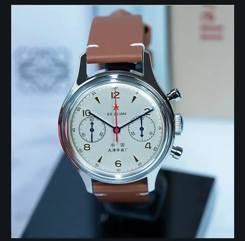 Seagull 1963 mechanical chronograph watch on brown leather strap; white dial with subdials