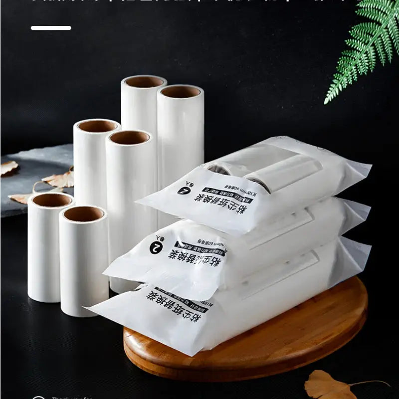 Lint roller refill set by Simples Market, white tearable brush head refills with replacement rolls.