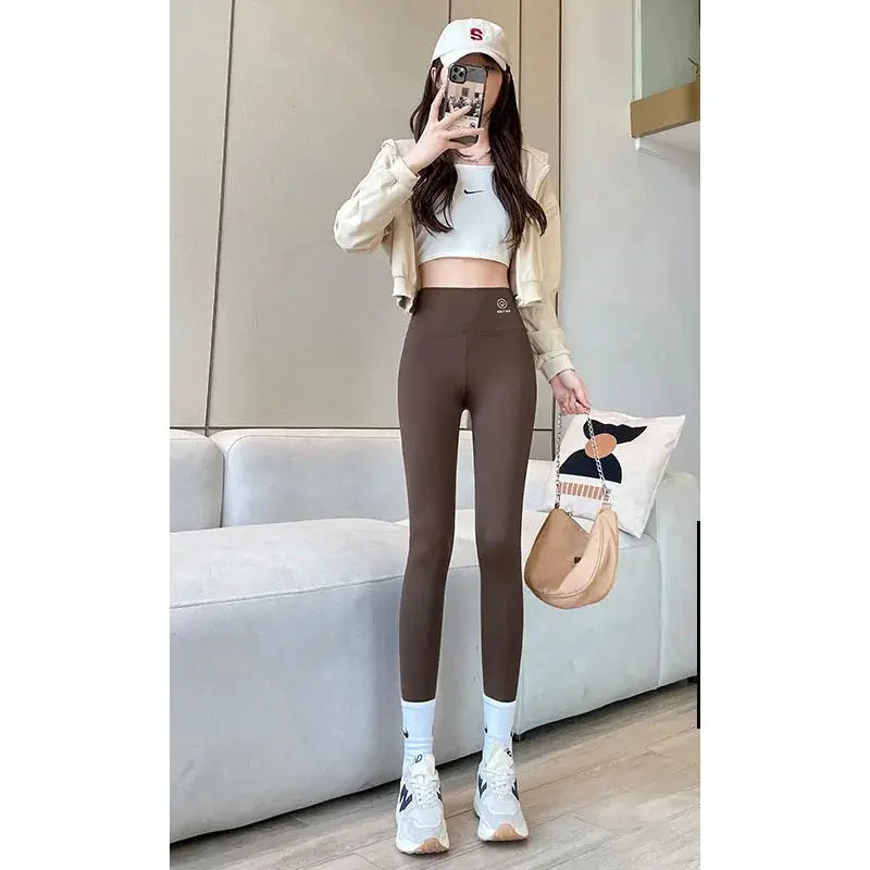 Simples Market high-waisted yoga leggings in brown full-length athletic tights with stretch fabric