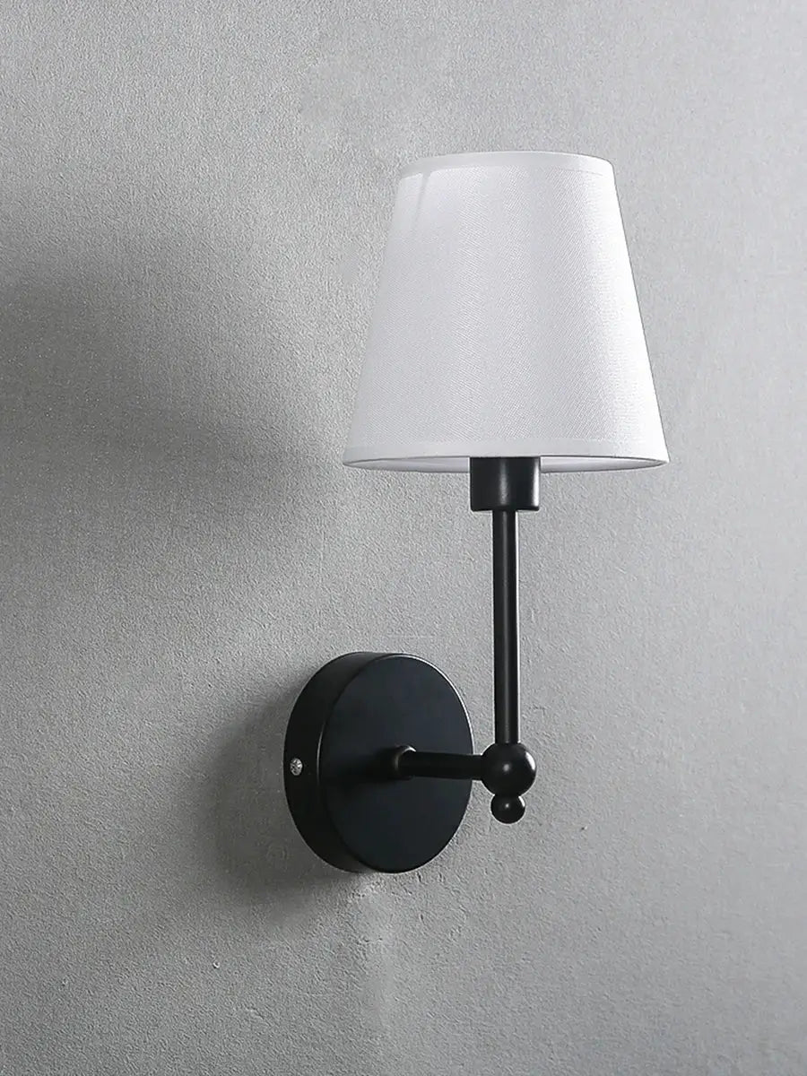 American retro wall lamp by Simples Market, black metal base with white fabric shade.