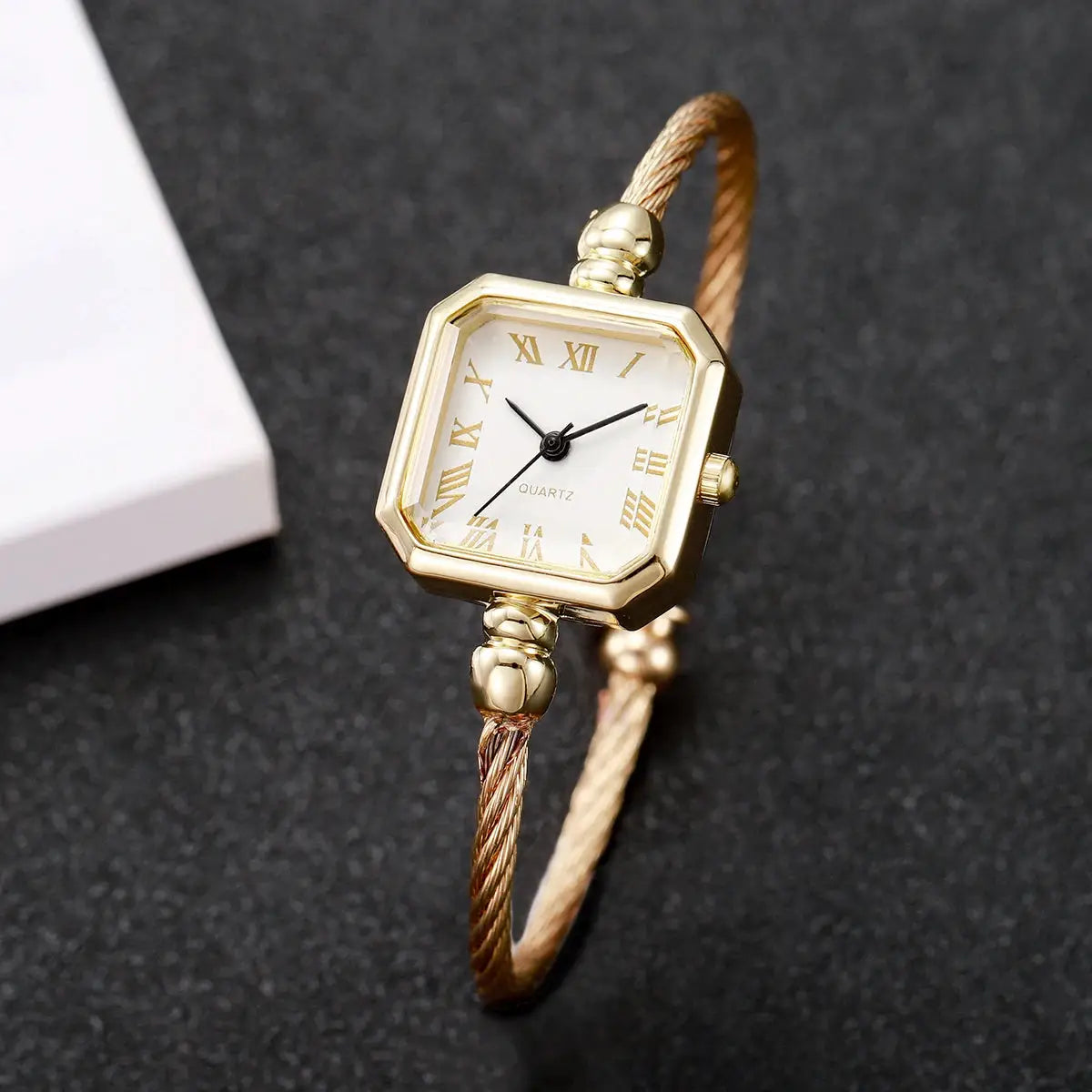 Gold-tone women's square Roma-dial quartz watch with braided bracelet strap