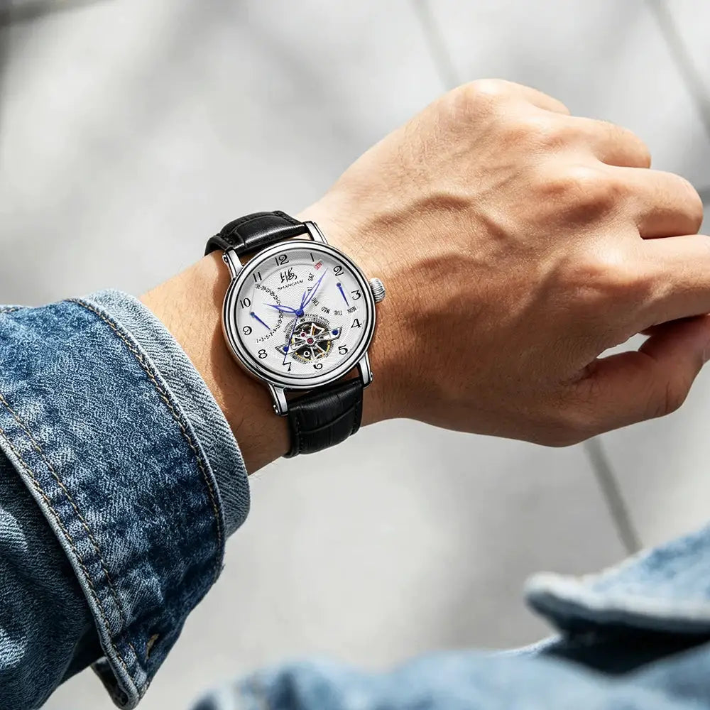 Shanghai 42mm stainless steel watch by Simples Market with white dial, blue hands, open-heart, leather strap