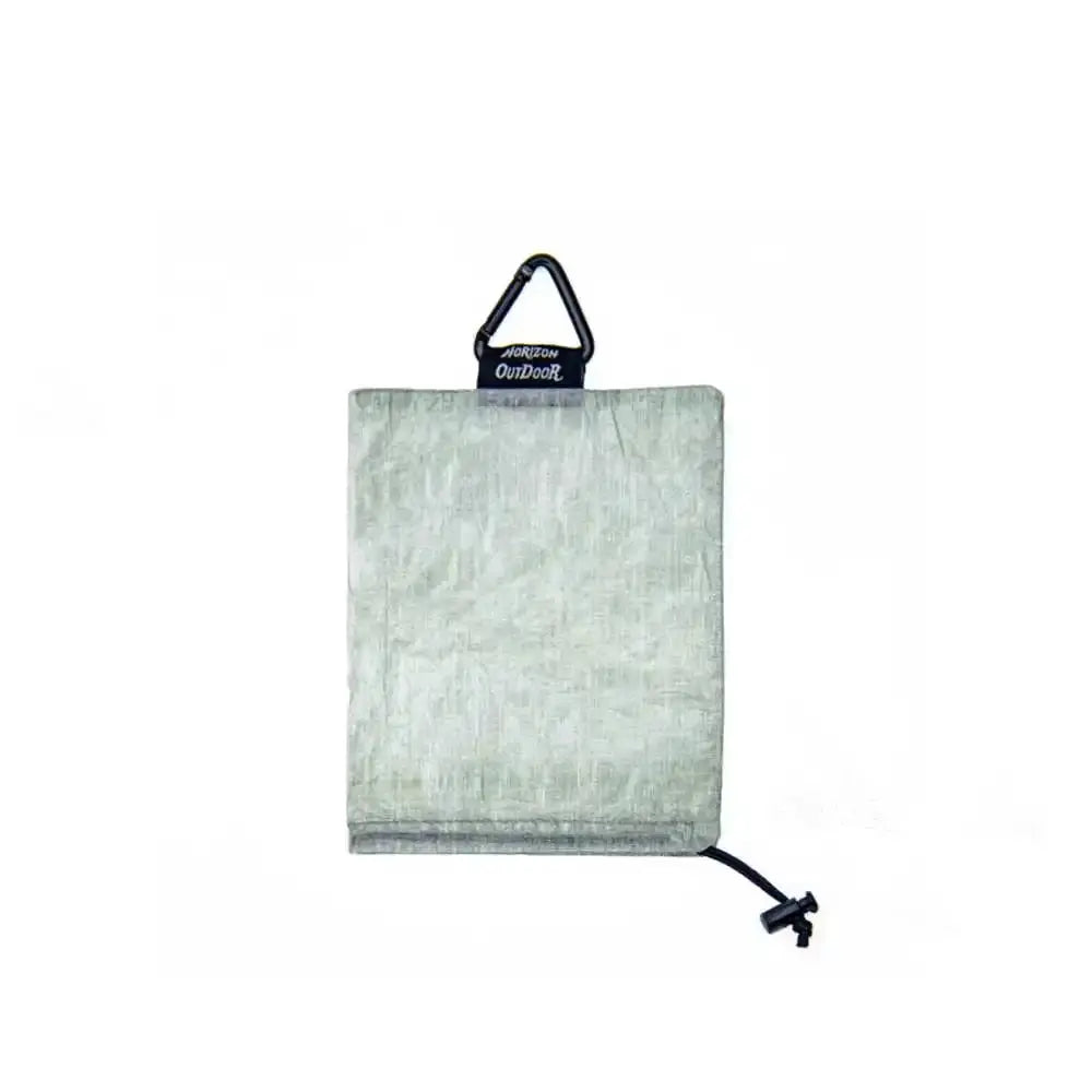 STASHLITE Dyneema DCF stuff sack in gray Cuben fiber with drawstring and top carabiner loop.
