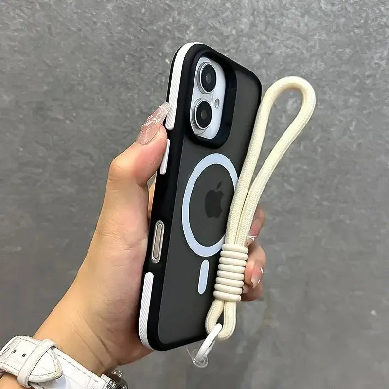 Simples Market MagSafe wrist-strap phone case for iPhone; matte black with white trim and cream lanyard