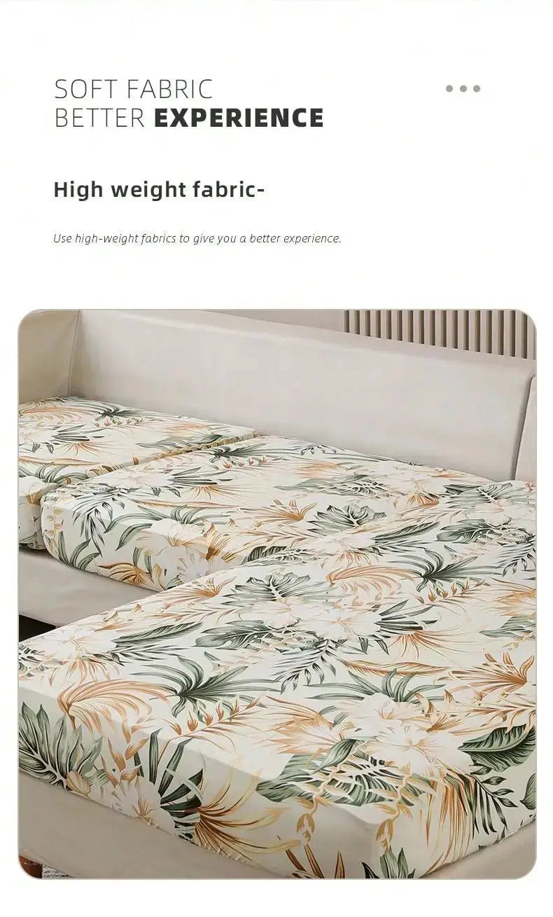 Milk-silk sofa cover with tropical rainforest leaf print; elastic, dust-proof, detachable