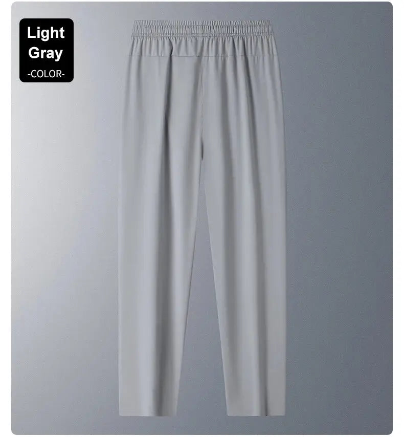 Running pants in light gray, elastic waistband, soft stretch fabric for casual workouts