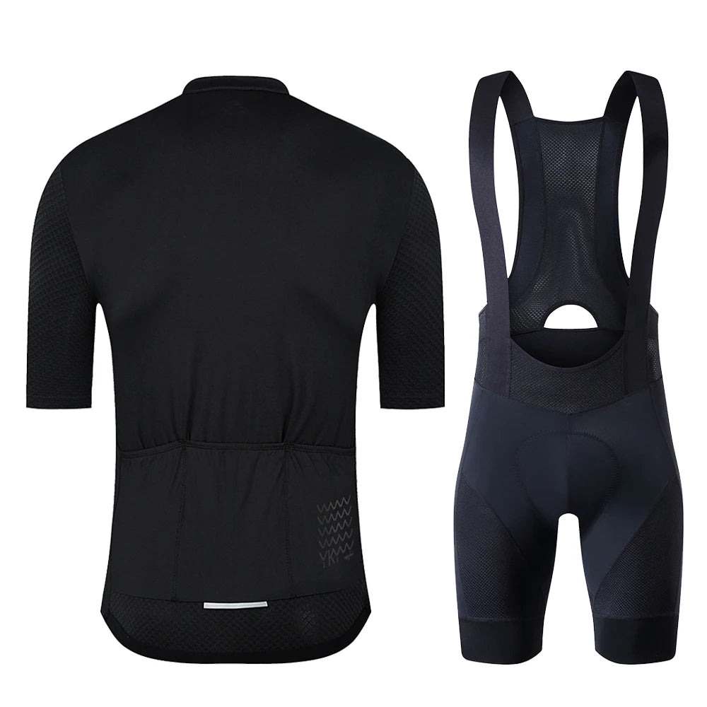 YKYWBIKE cycling jersey set with bib shorts; black jersey with reflective back strip and dark navy bib shorts.