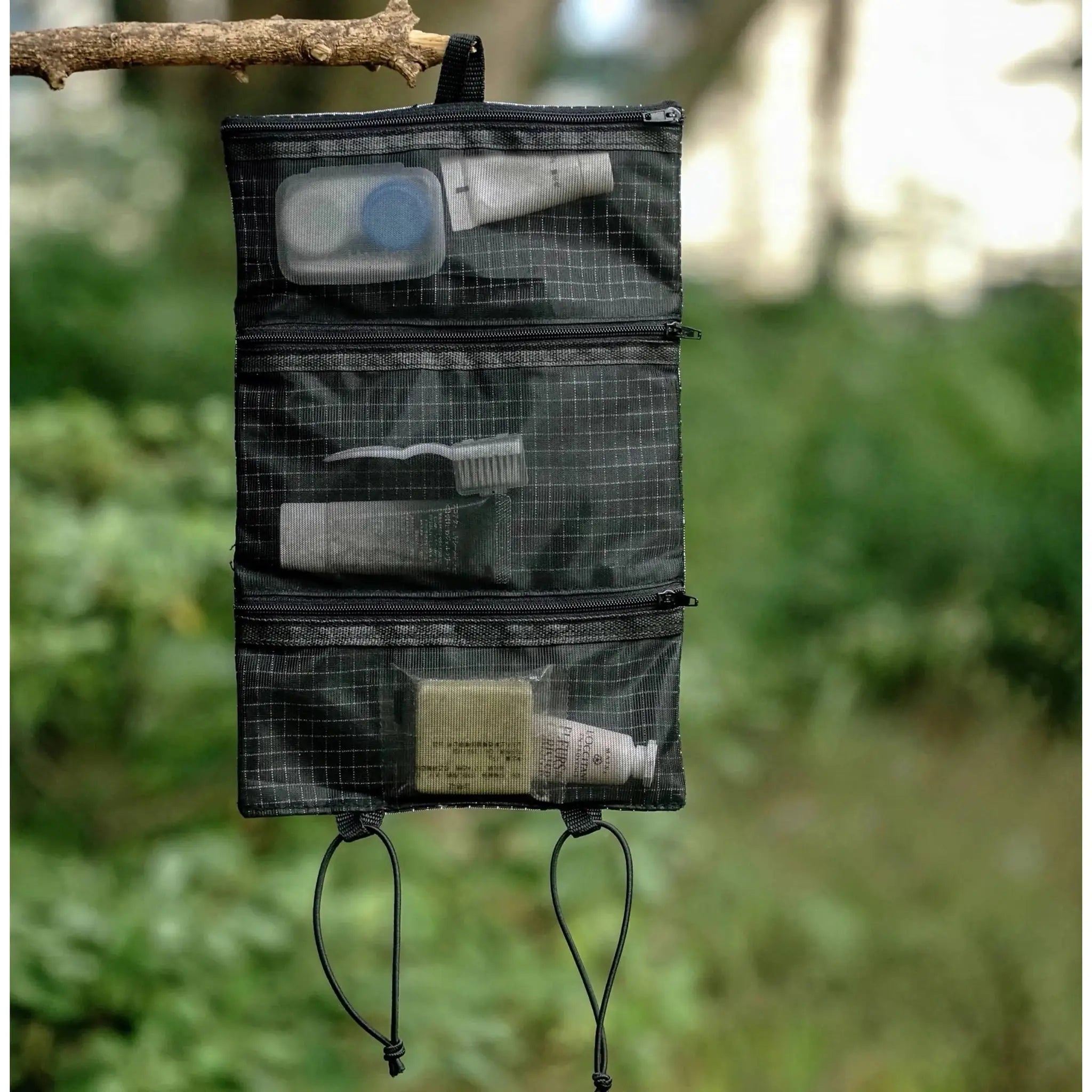 HODRGEAR Ultralight Toiletries Organizer by Simples Market, black UHMWPE gridstop roll-up pouch with clear pockets