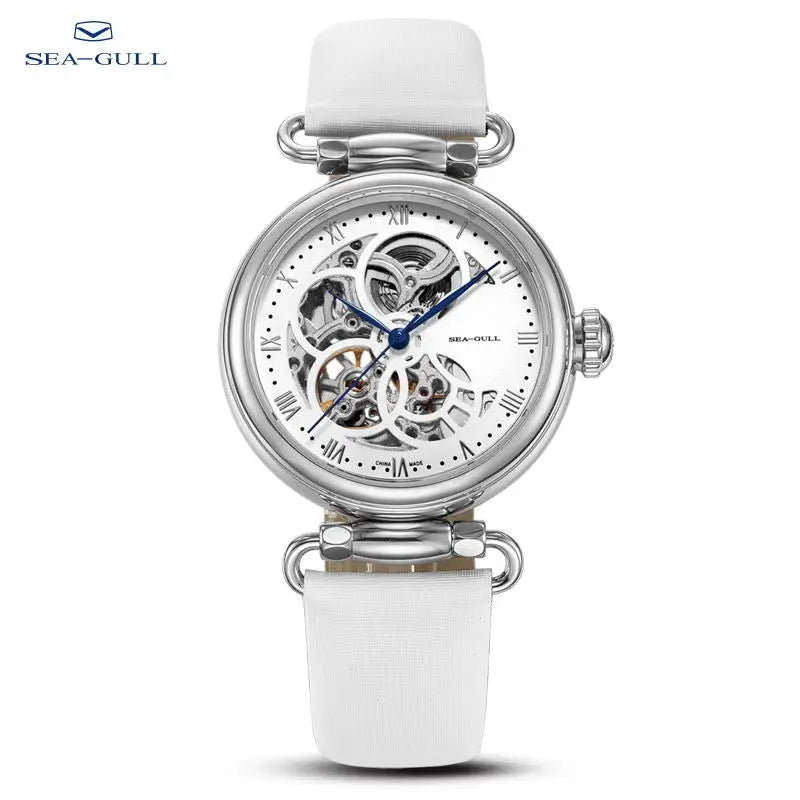 Sea-Gull skeleton automatic ladies watch with white dial, blue hands, and white leather strap.